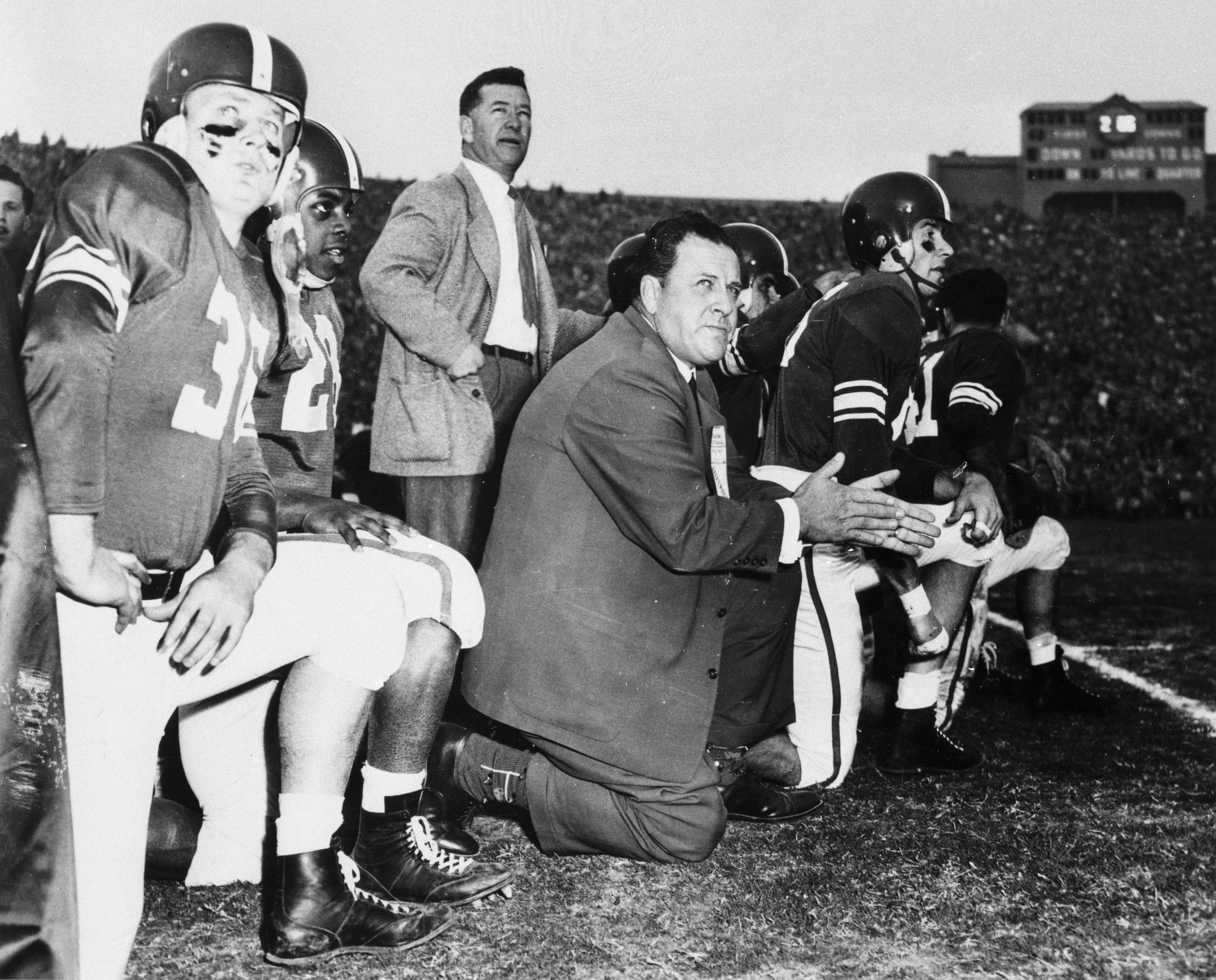 Coaches & Players on sidelines at 1954 Rose Bowl