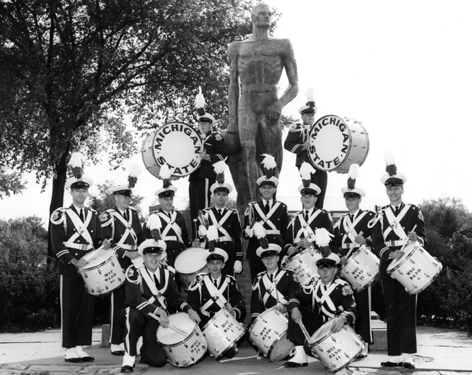 Marching Band Drum Section posing with the Spartan, 1962