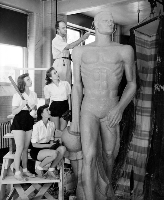 Three Members of the Softball Team Check on Sparty, 1944