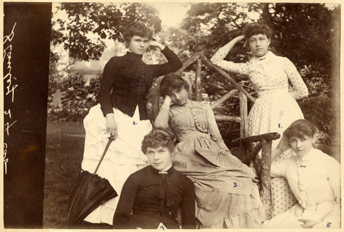A group of 5 women pose on a summer day, 1886