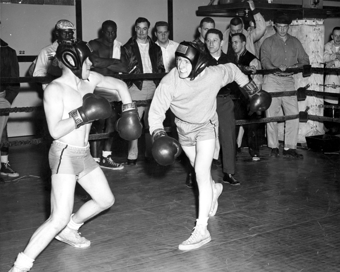 Two students box at an intramural match, 1957