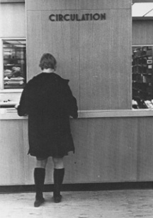 Woman at circulation desk