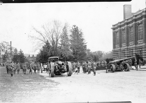 Student military with Howitzer on campus, 1923