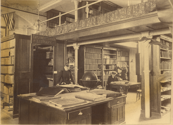 Miss Landon and students in the Experiment Station Library, date unknown