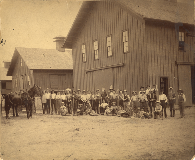 Agriculture students by the  barns, 1886