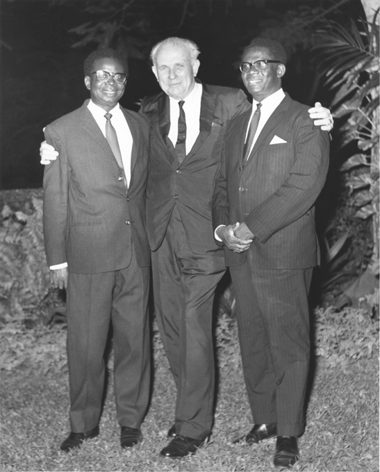 Hannah poses with Nigerian visitors, date unknown