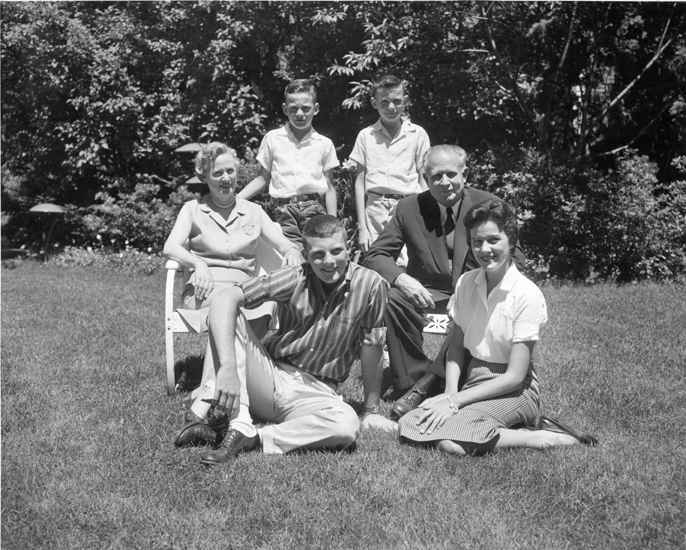 Hannah and his family posing at the Cowles House, date unknown