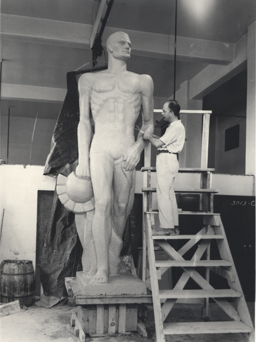 Jungwirth carves the Spartan statue, 1944