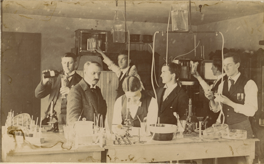 Students work in a lab on bacteriology, ca. 1890