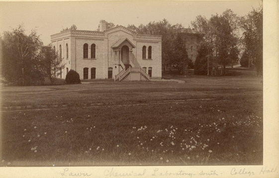 The south lawn of the Chemical Lab with College Hall, date unknown