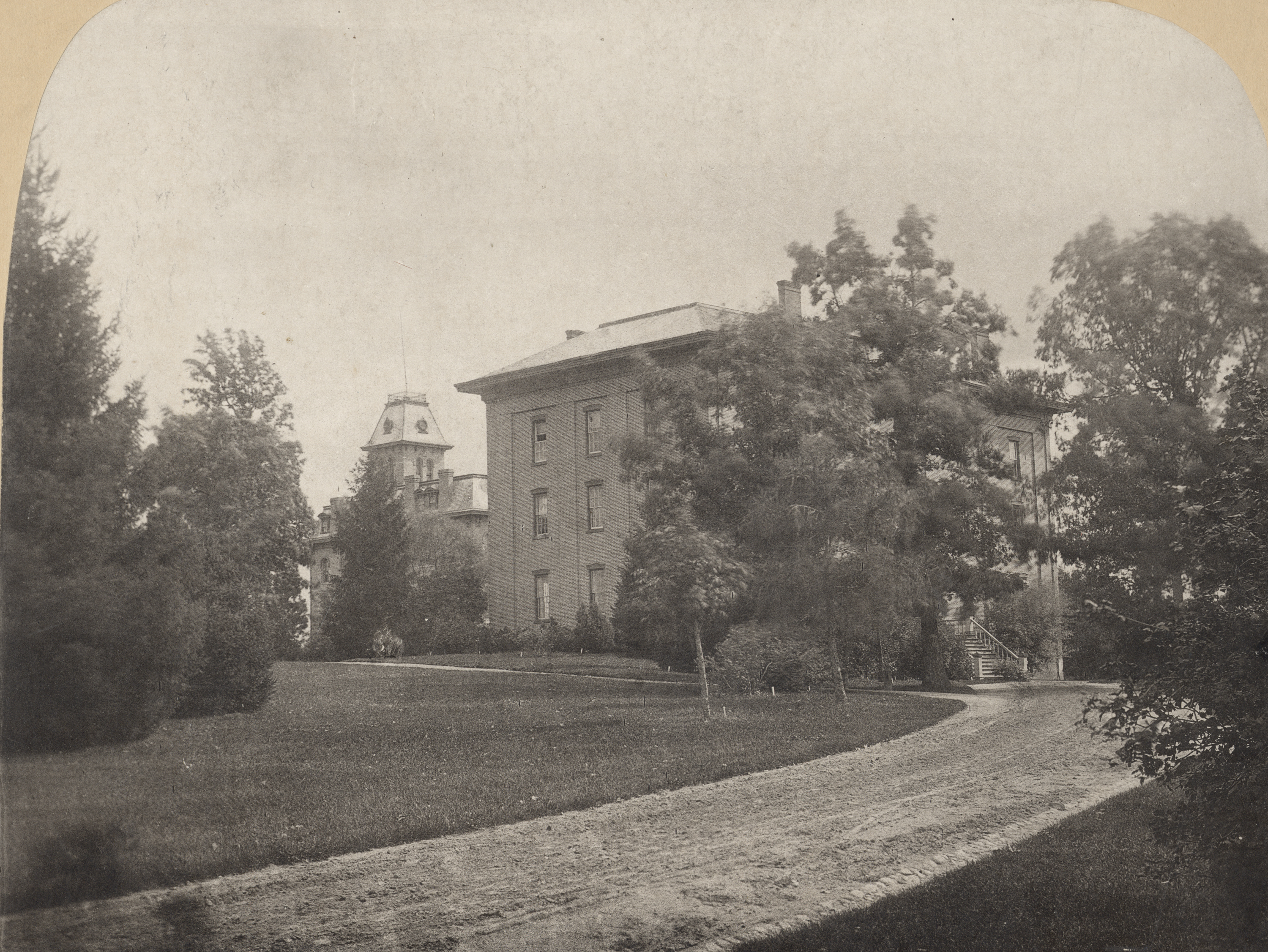 A view of the road leading up to College Hall, date unknown