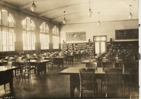 Tables and chairs inside the library, date unknown