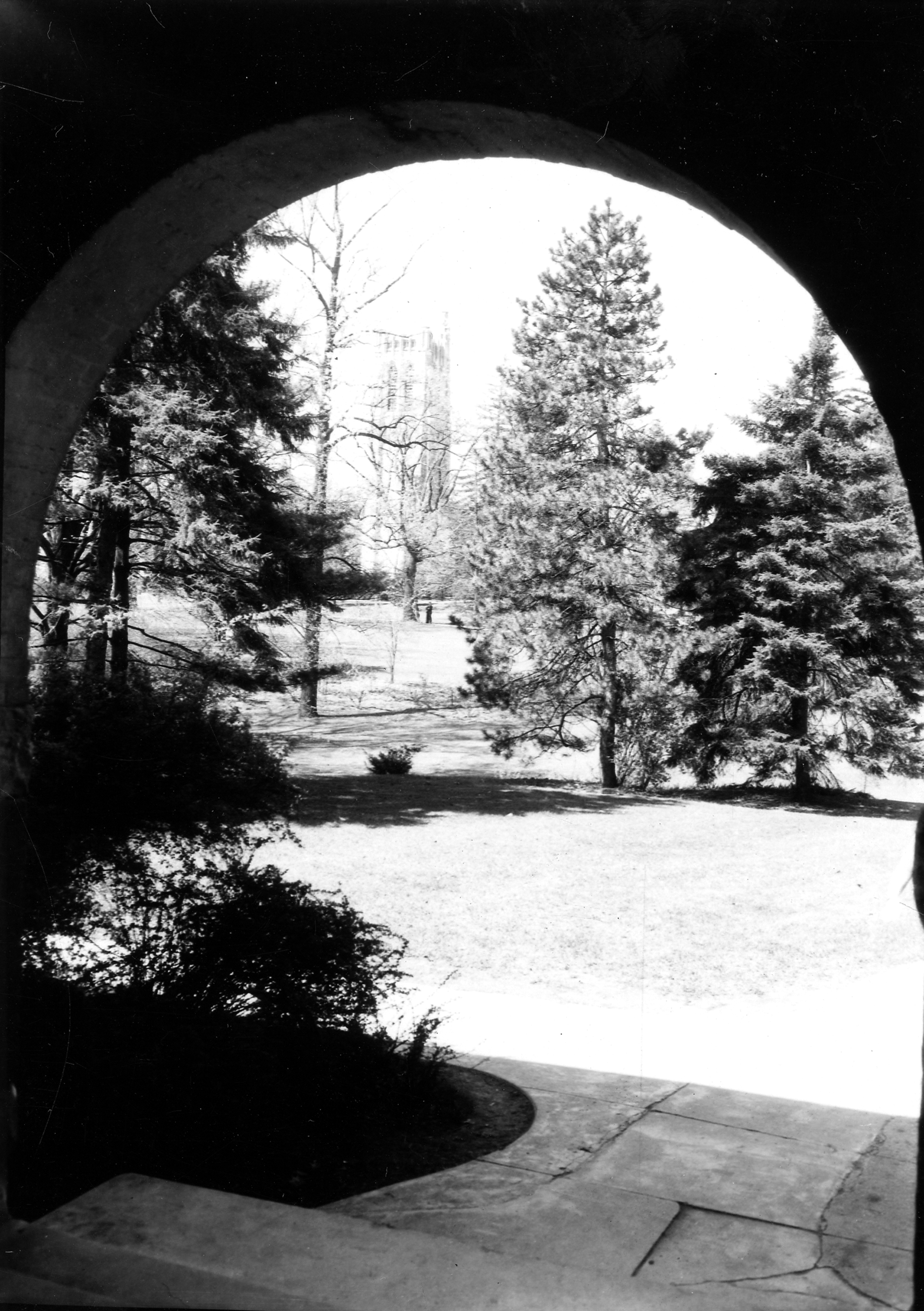 The view of Beaumont Tower through an archway, date unknown