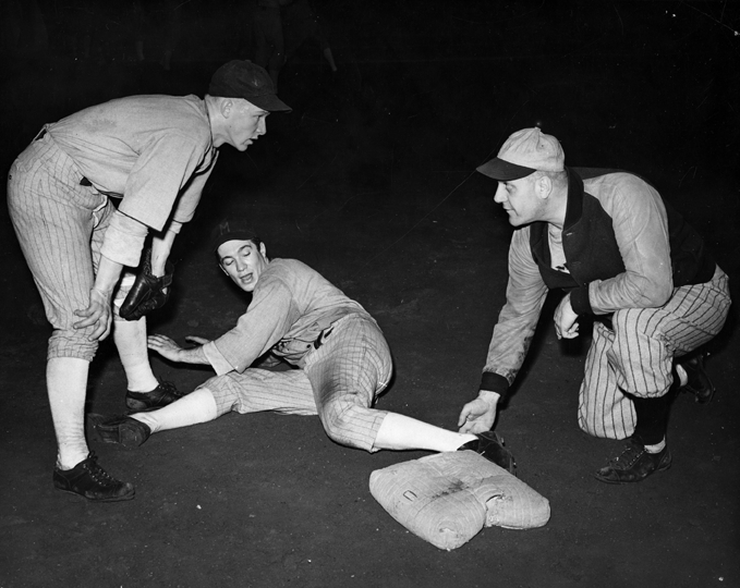 A baseball player's slide is disputed, date unknown