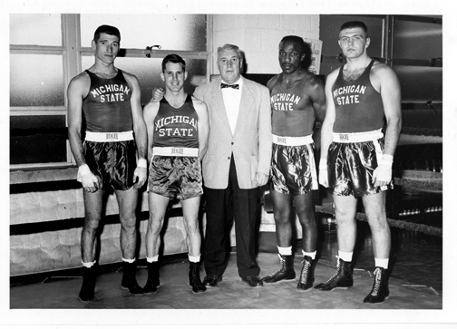 Coach Brotzmann and four boxers, January 27, 1958
