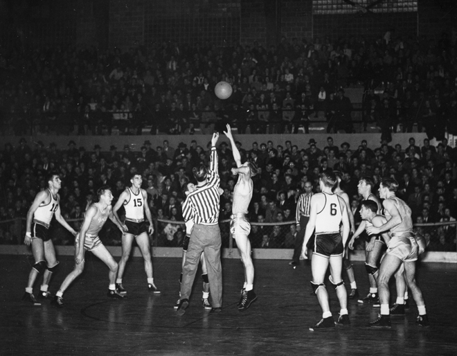Tip off of a basketball game, 1940