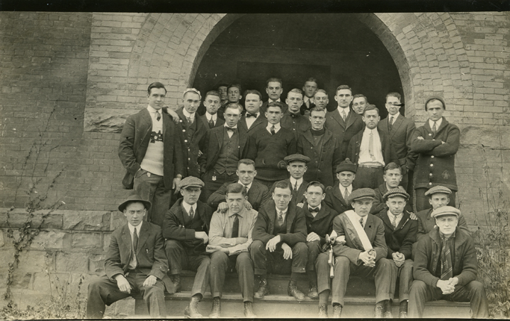 Students standing outside a building, date unknown
