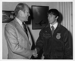 President Gerald Ford with male student, 1975