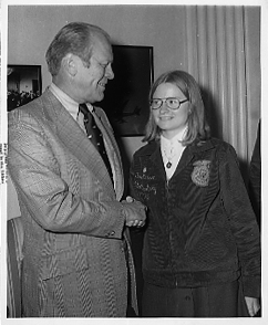 President Gerald Ford meets with female student, 1975