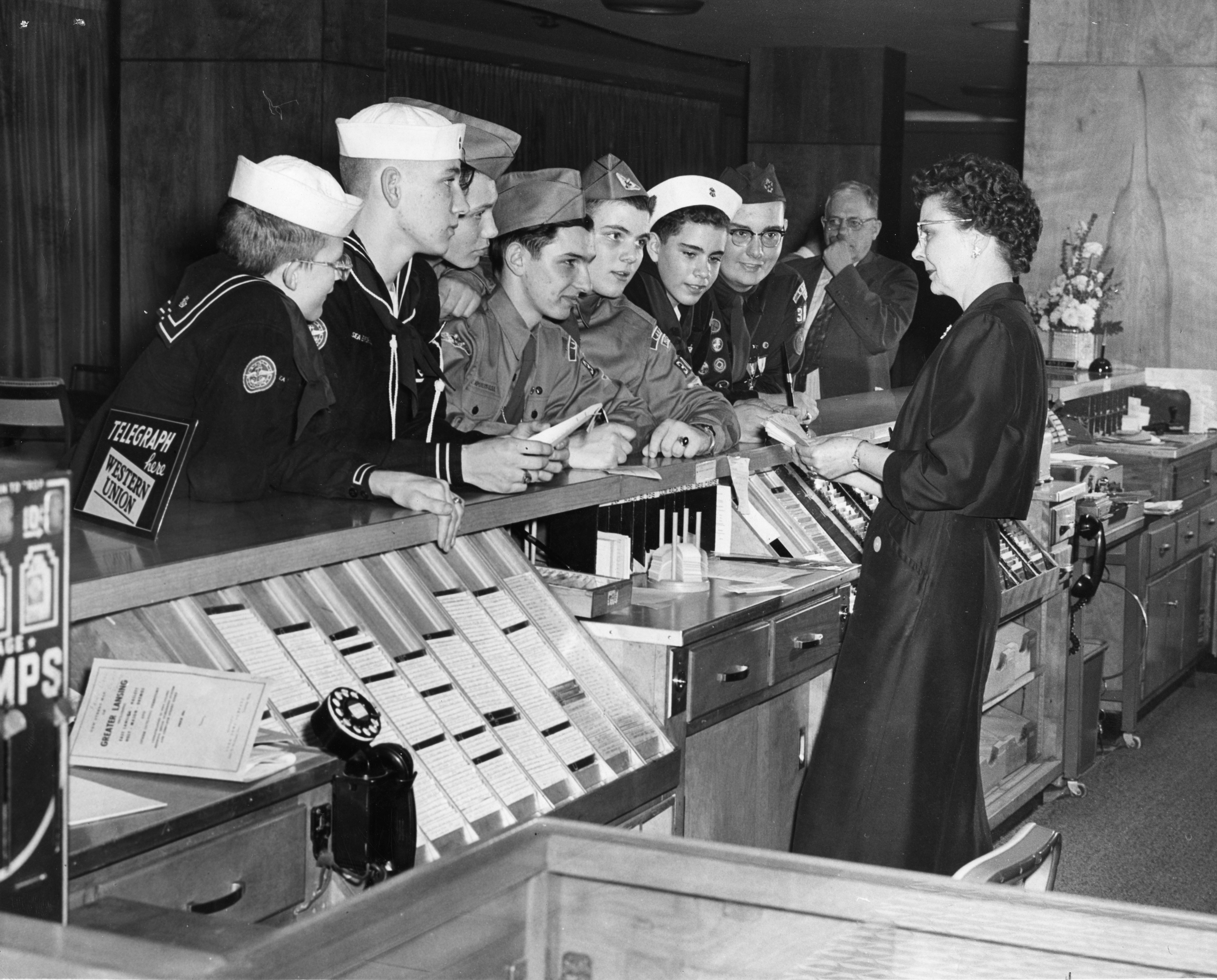 Servicemen at the Kellogg Center registration desk, 1957