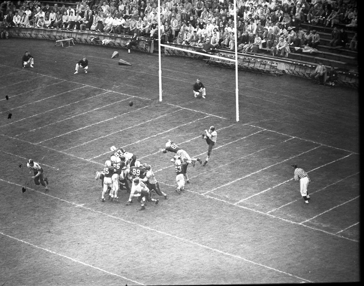 Michigan State vs. Wisconsin football action shot, 1954