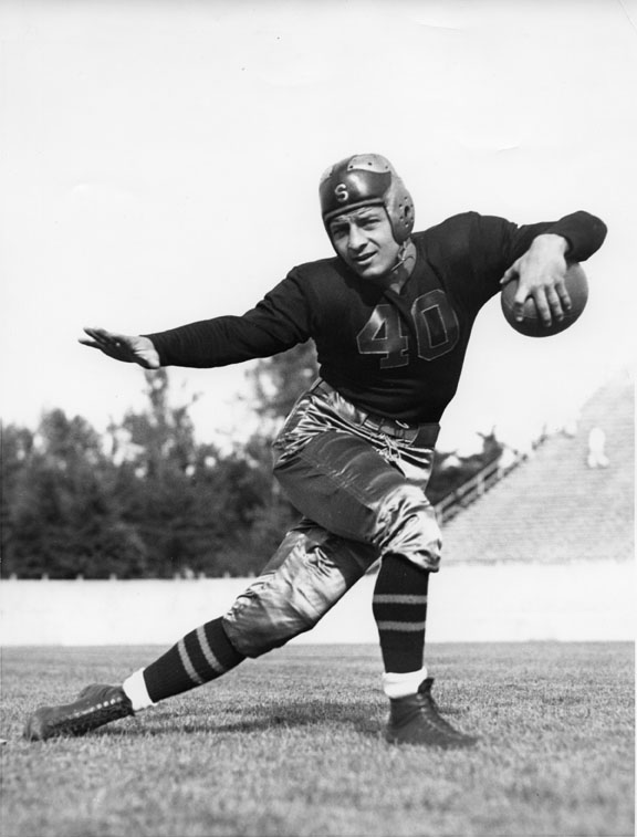 Posed football player, undated