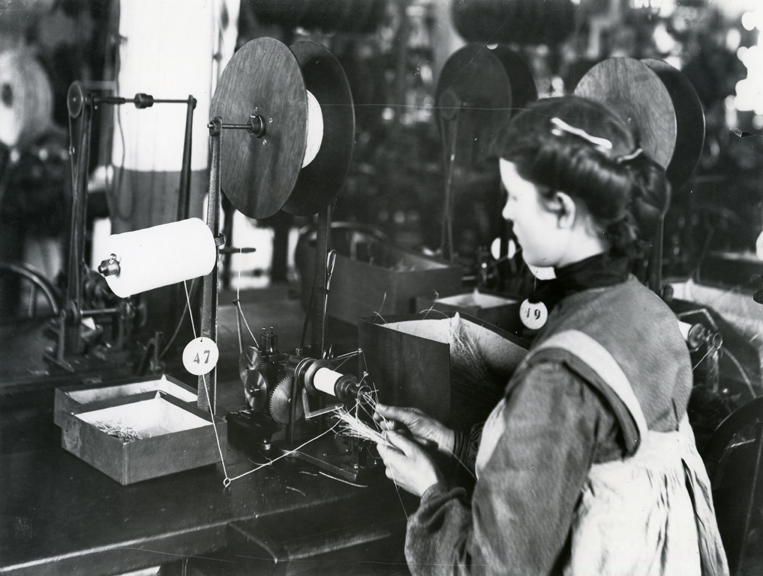 Woman working at machine
