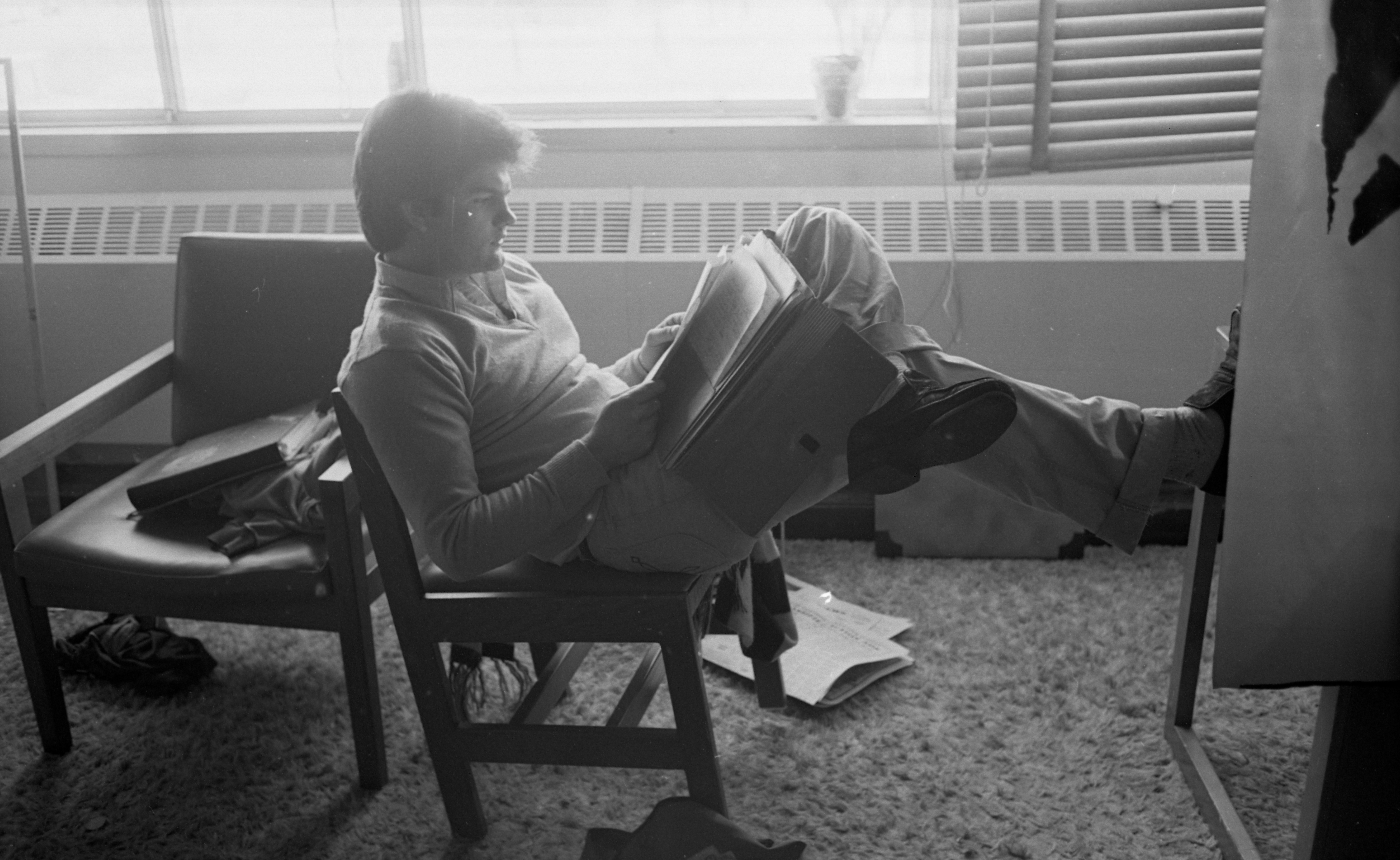 A man studying in Bryan Hall, 1982