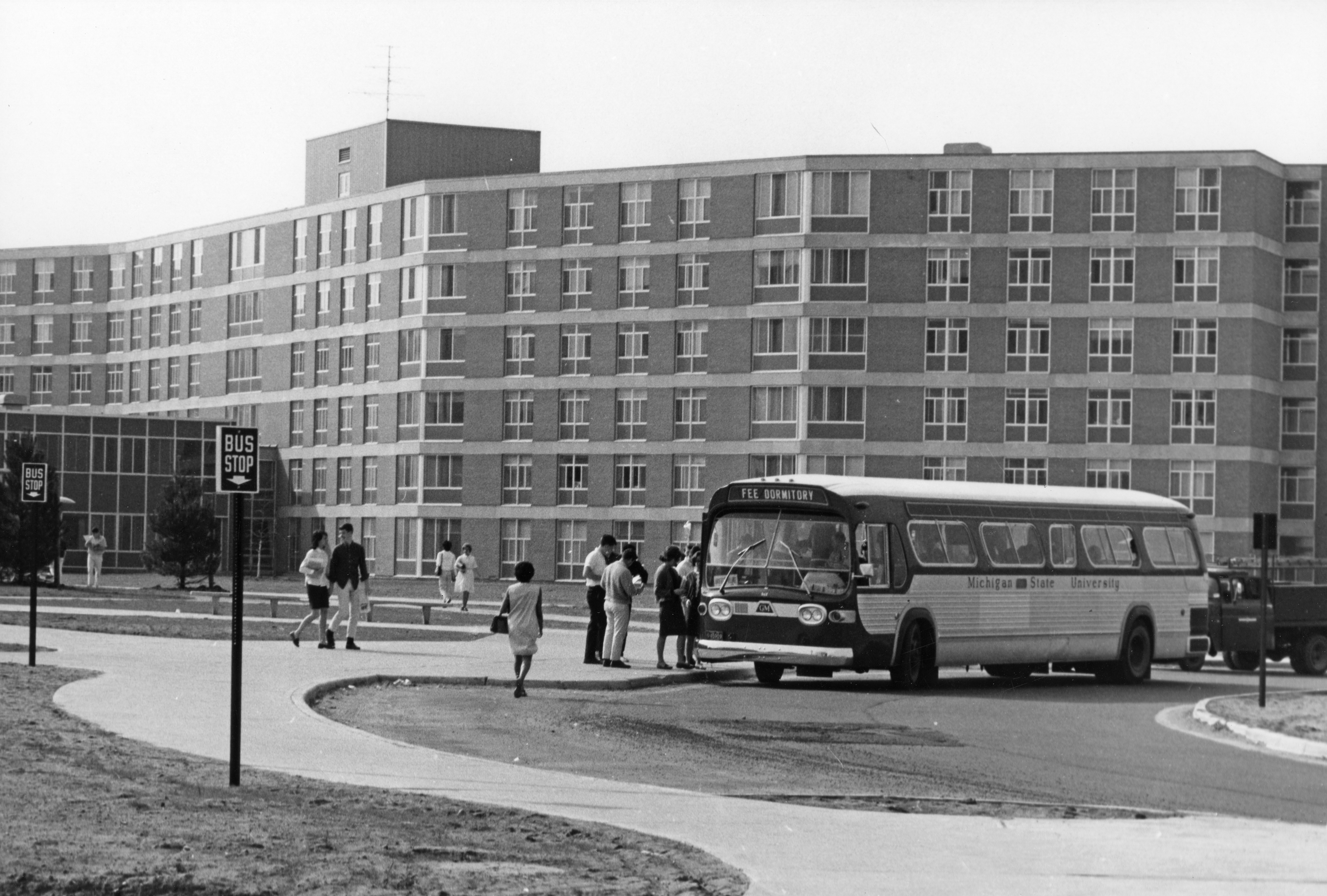 MSU bus in front of Fee Hall, 1965