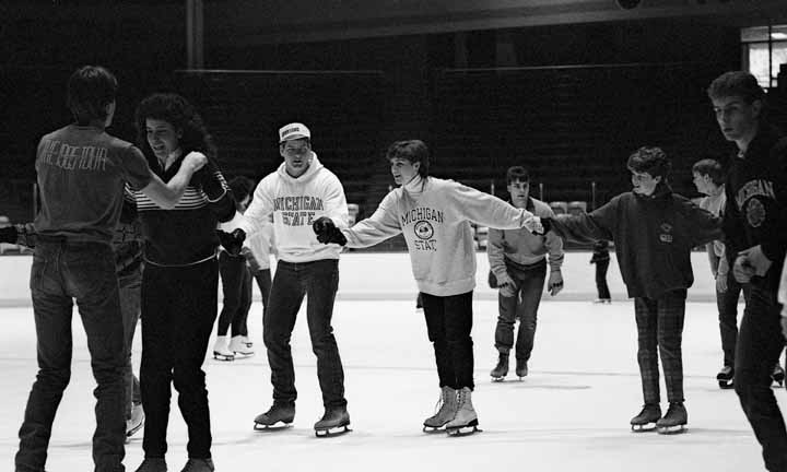 Students and Families Ice Skating at Munn Arena