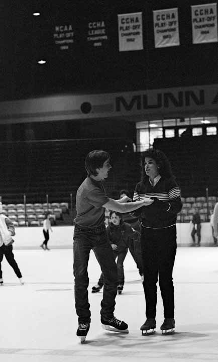Pair of Students Ice Skating at Munn Arena