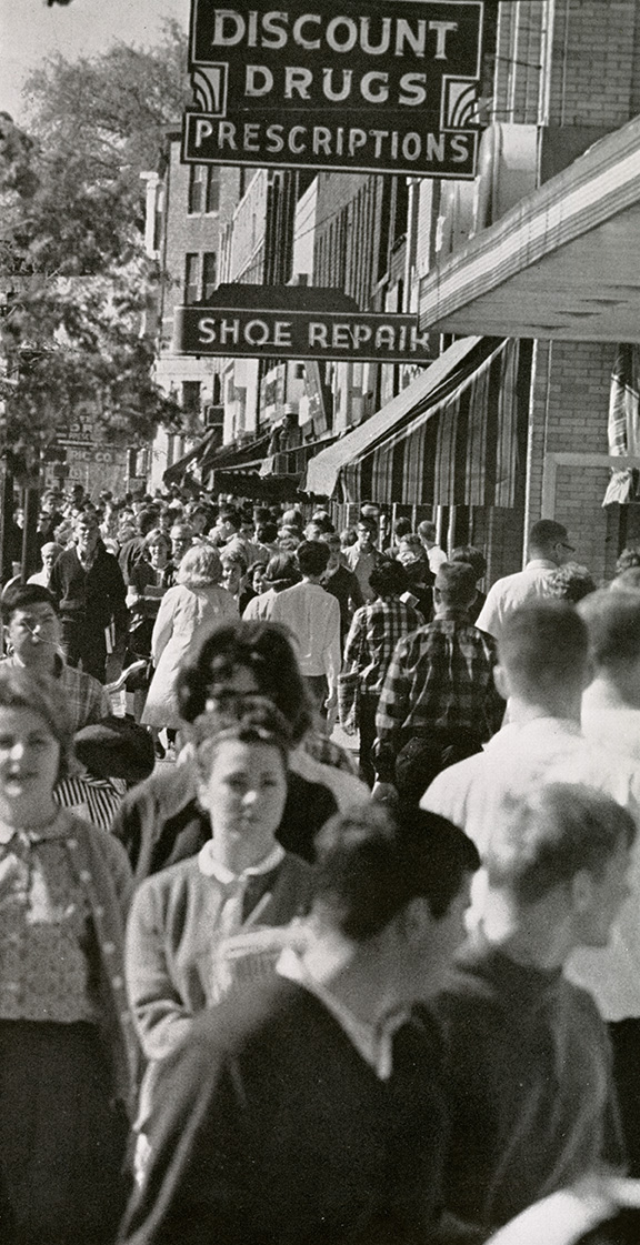 View of Grand River crowded with students, 1965