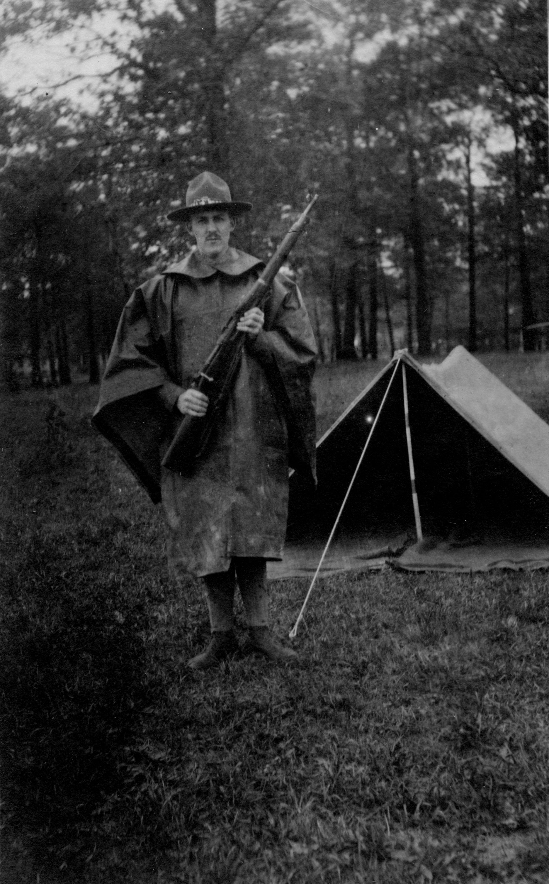 Soldier with Rifle Outside Tent, circa 1918