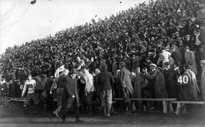 Fans at a M.A.C. vs University of Michigan football game, ca. 1913