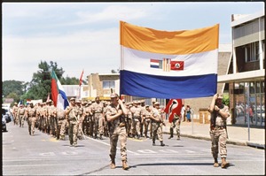 Storm troopers of the Afrikaners Weerstandsbeweging (Afrikaner Resistance Movement) carrying the South African flag during a right-wing rally in Klerksdorp in 1993.