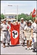 Youths carrying the Afrikaner Weerstandsbeweging (African Resistance Movement) flag during a right-wing rally in Klerksdorp in 1993.