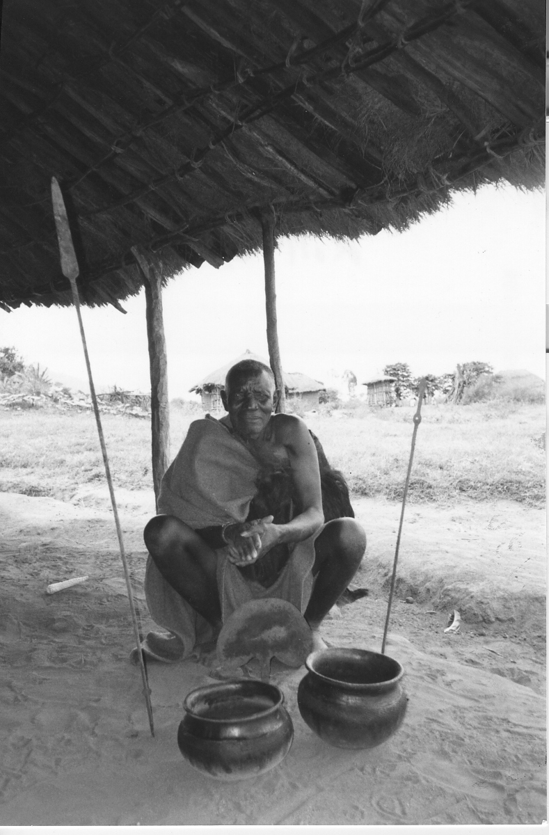 Photograph of Ikota Mwisagija with the medicines of rainmaking from the Ikizu chiefly clan of Nyakinywa.